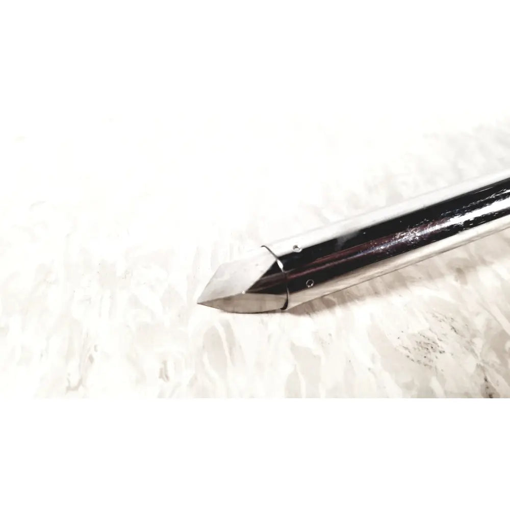 Shiny metallic arrowhead with pointed tip and reflective surface from eder instrument cat 1110 c3 for gsh endoscope