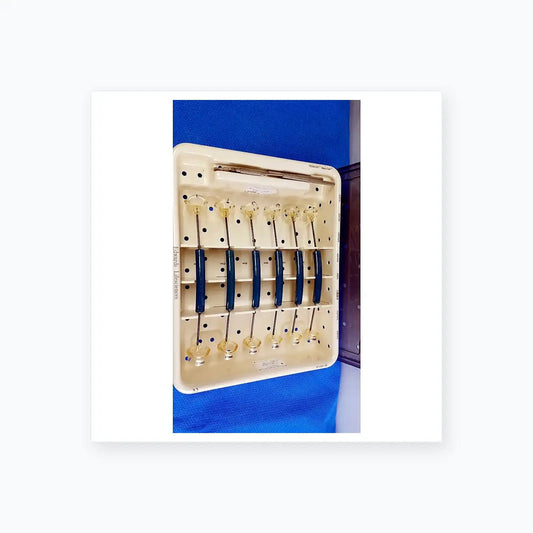 White plastic tray holding six blue-handled Edwards Life Science Perimount Magnas Ease aortic valve sizers for buy used medical equipment