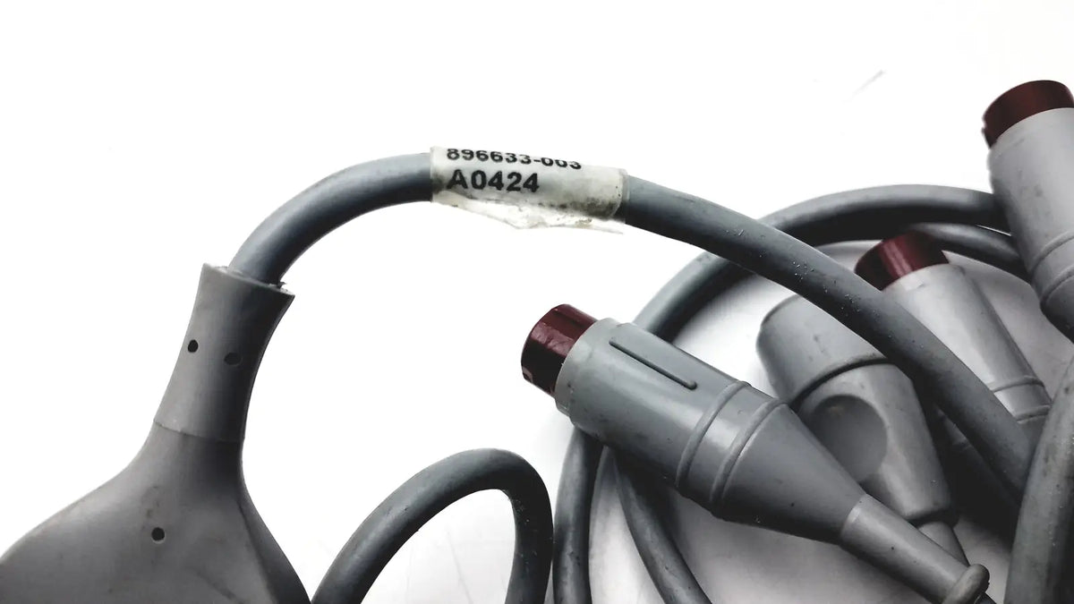 Gray coiled edwards lifesciences a0424 truwave reusable cable with gray connectors and maroon caps for medical use
