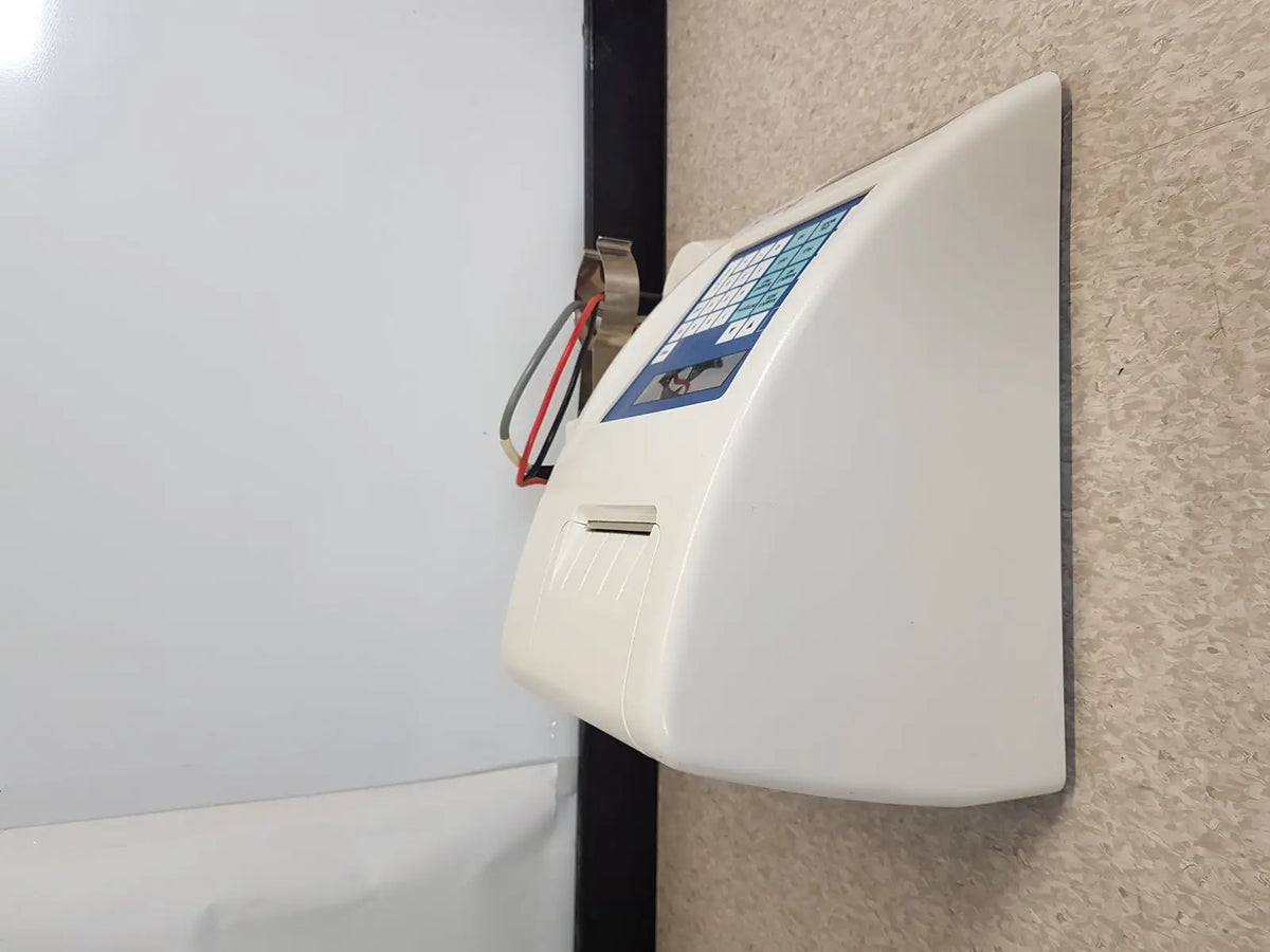 White wall-mounted ticket validator with blue keypad and ticket slot for science hiranuma aquastar c3000 coulometric titrator