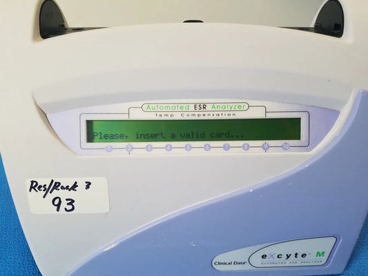 White and light blue plastic excyte m automated esr analyzer with green lcd screen displaying please insert a valid card message