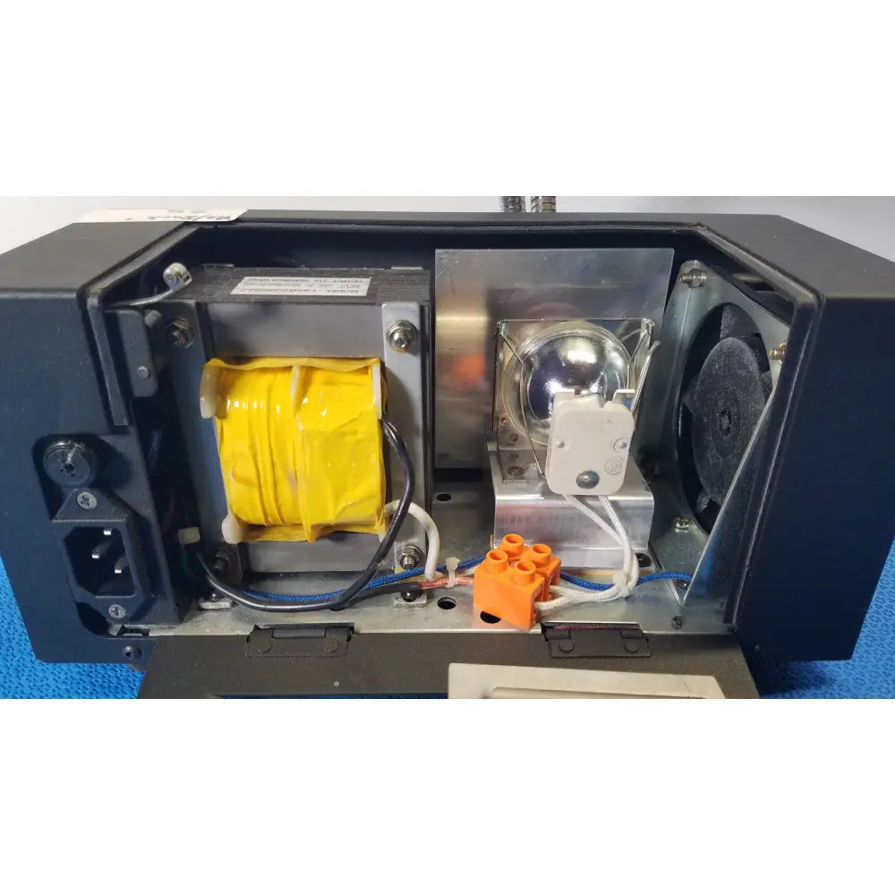 Black electronic device housing with yellow transformer silver lamp and orange connectors on fisher scientific dual fiber-optic illuminator