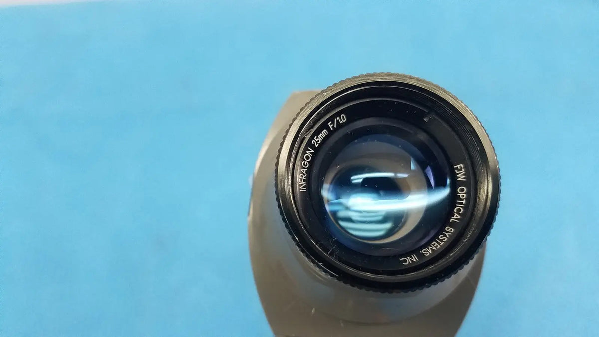 Black and silver 25mm f 10 infrared lens from FJW Optical Systems for Find-R-Scope infrared viewer by FJW Optical