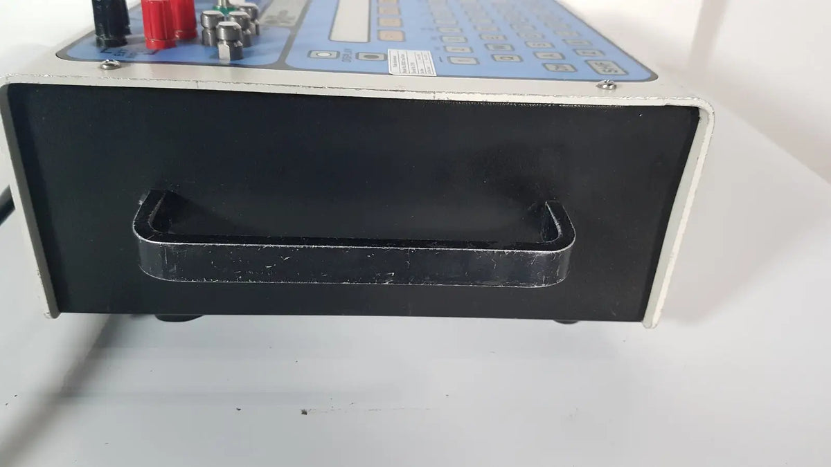 Black plastic fluke biomedical medtester 5000c automated electrical safety analyzer with silver handle and blue control panel