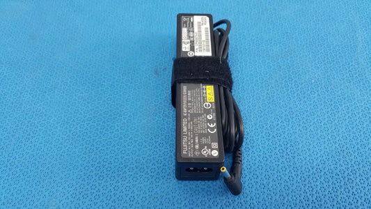 Black plastic fujitsu ac adapter power supply 19v 3.16a with coiled cable and black velcro strap for laptops