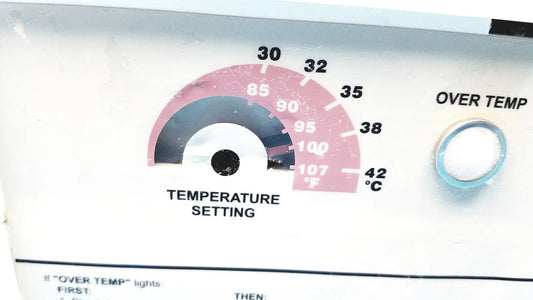 White plastic temperature dial with pink and gray fahrenheit celsius markings on gaymar t pump tp500c heat therapy pump