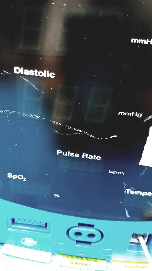 Blue GE carescape dinamap v100 vital signs monitor displaying diastolic pressure pulse rate and spo2 with cuff used tested working