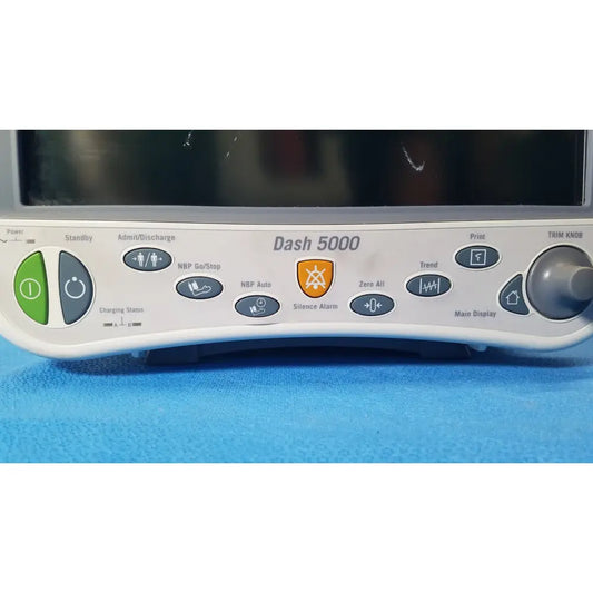 White ge dash 5000 patient monitor ecg control panel with gray and green buttons for reuse medical use