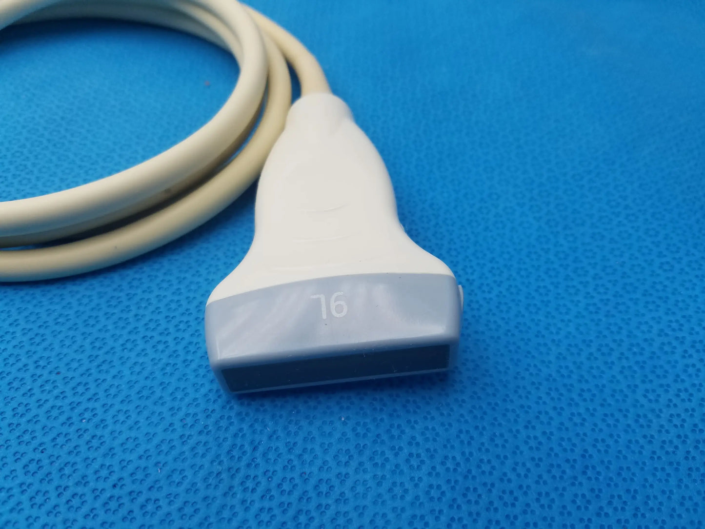 Ge healthcare 9l-rs linear array ultrasound probe with white and gray transducer and beige cable for ultrasound imaging