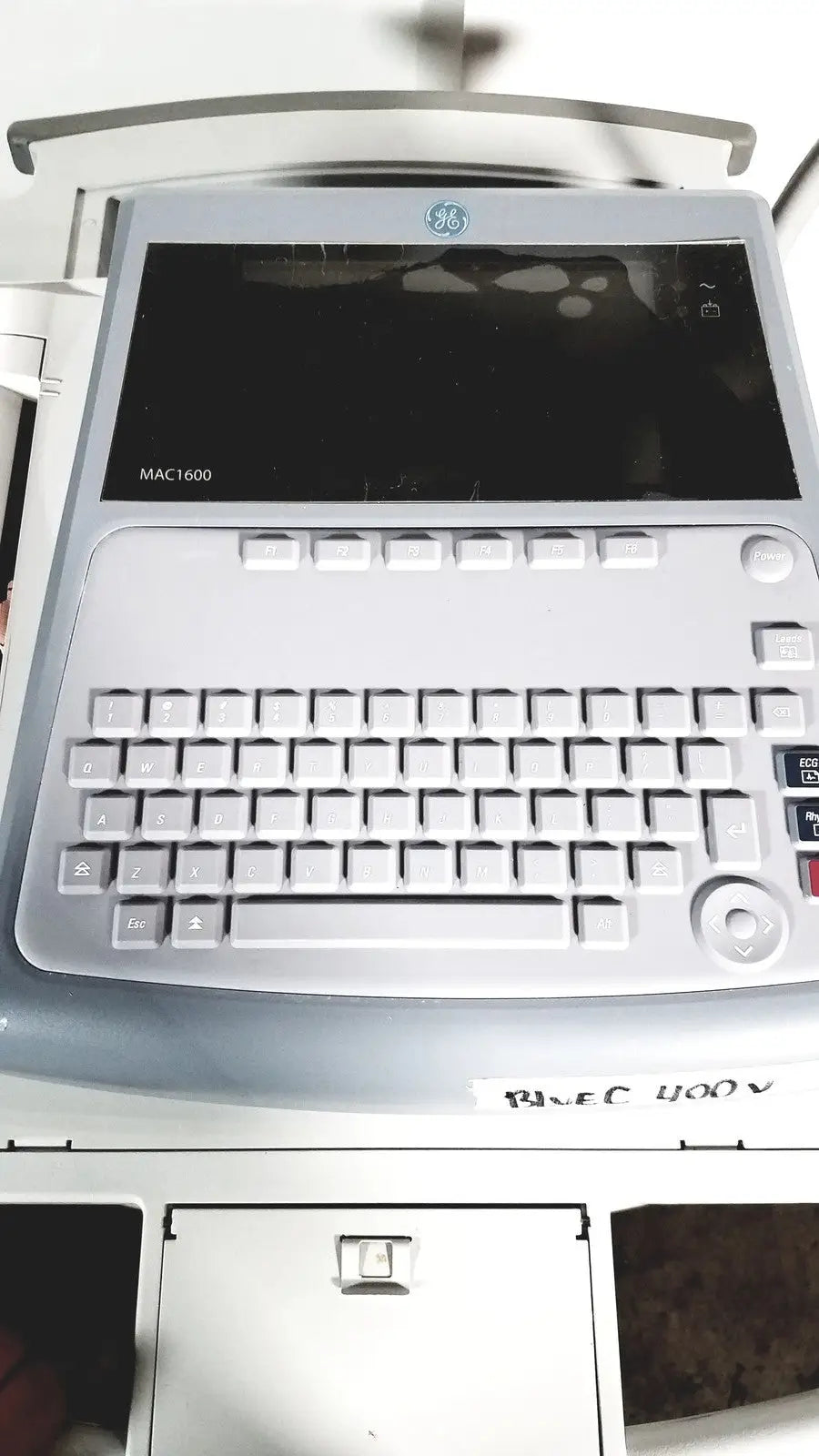 Ge mac 1600 ekg ecg analysis system with sleek silver and gray design featuring integrated keyboard and touchscreen display