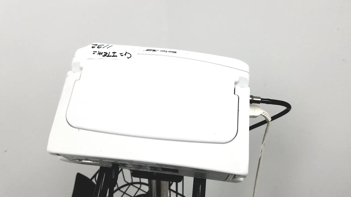 White plastic medical device with hinged lid and cables for ge medical mini-torr plus patient monitor ref 3444