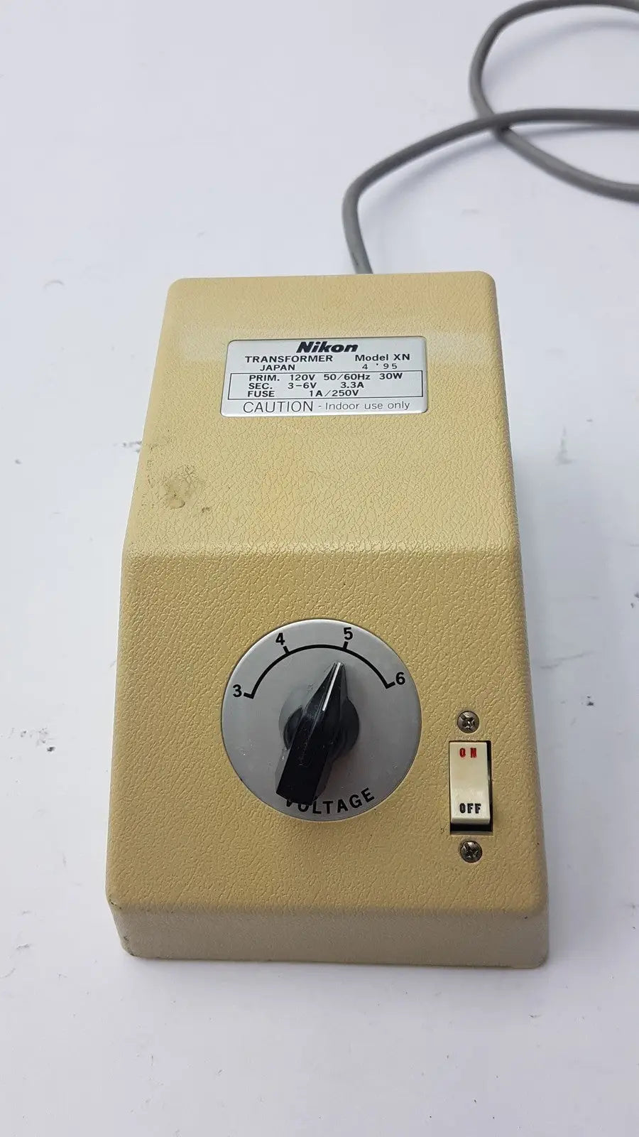Beige genuine nikon transformer xn made in japan with voltage dial and toggle switch for precise power control