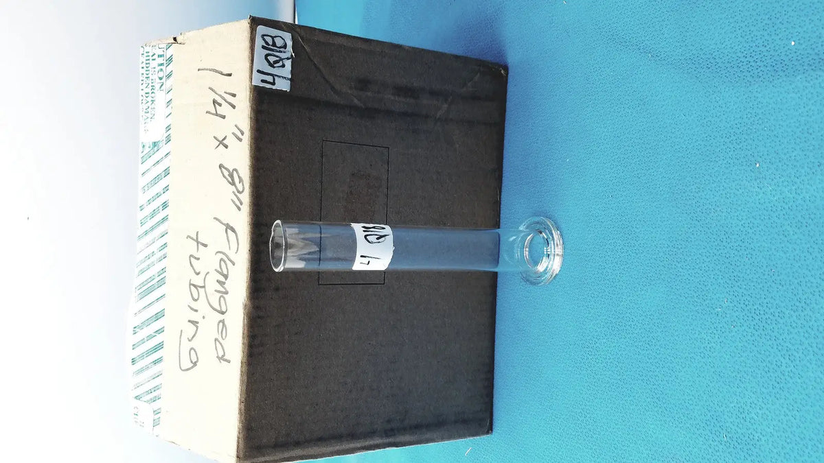 Clear glass borosilicate soil test cylinder with threaded cap and labeled fanged tubing for sedimentation analysis