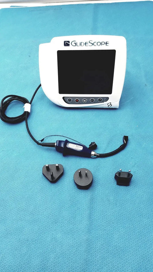 White glidescope video monitor an162878 with black screen and buttons connected to blue endoscope handle by coiled cable