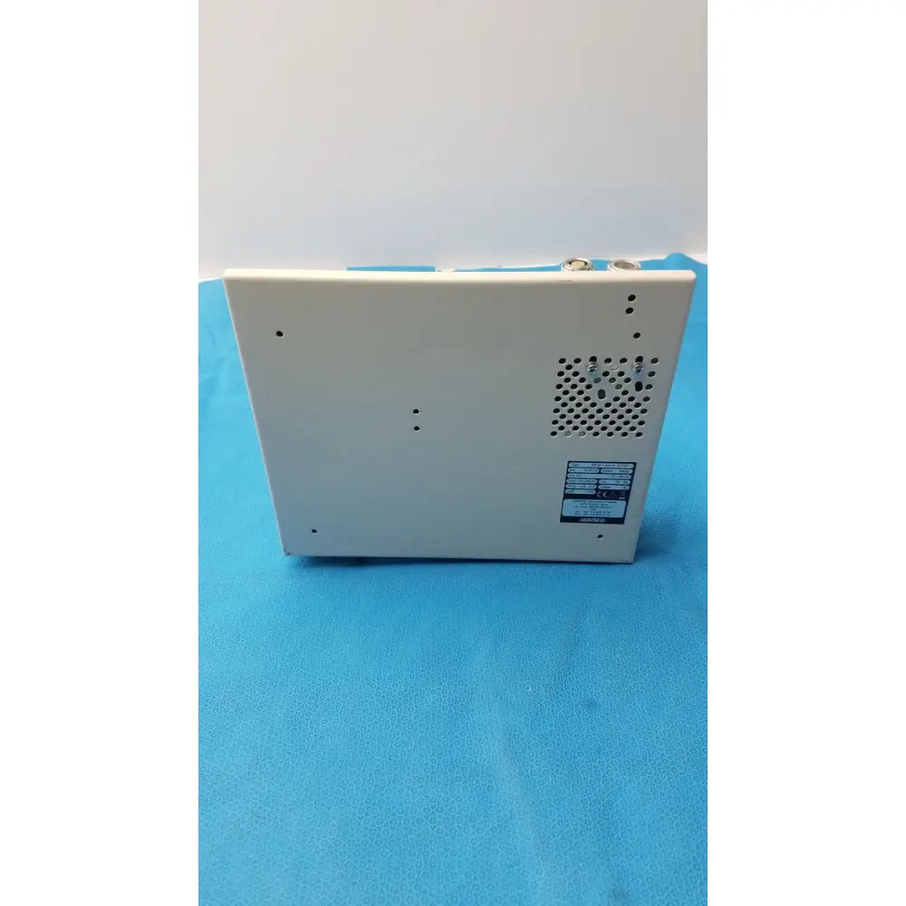 White rectangular medical monitor back panel with ventilation grille and certification label for globalmed jedmed xe30-eco