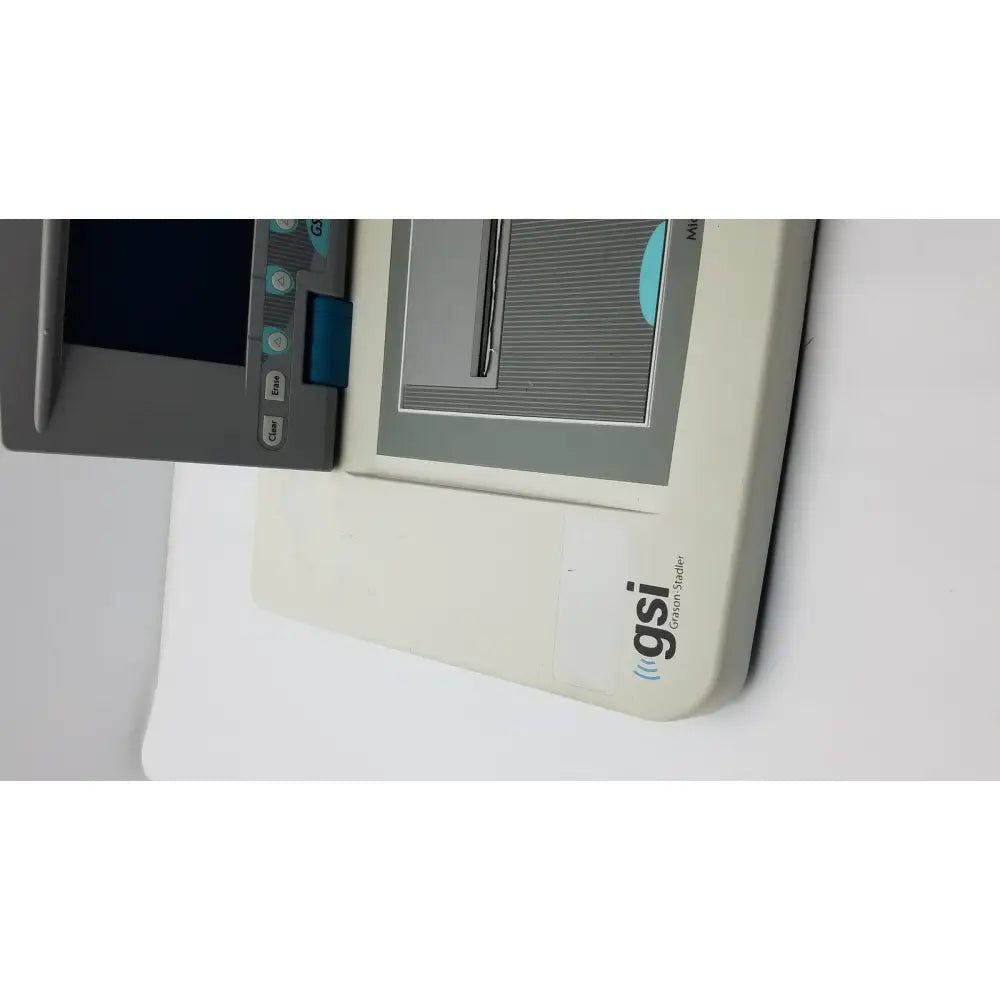 Beige grason stadler gsi tympstar middle ear analyzer with gray control panel and blue buttons for medical use