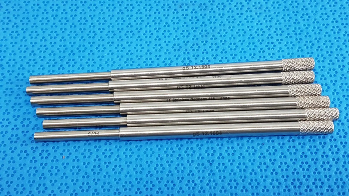 Set of seven german stainless steel surgical scalpel handle alignment rods with knurled ends and engraved markings