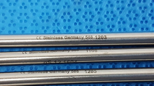 Four parallel german stainless steel surgical scalpel handles engraved with model numbers for precise medical use