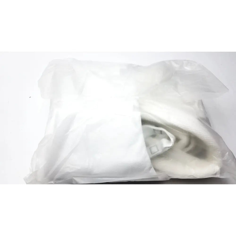 White plush blanket wrapped in clear plastic packaging for guldmann disposable gait trainer max 205 kg size large