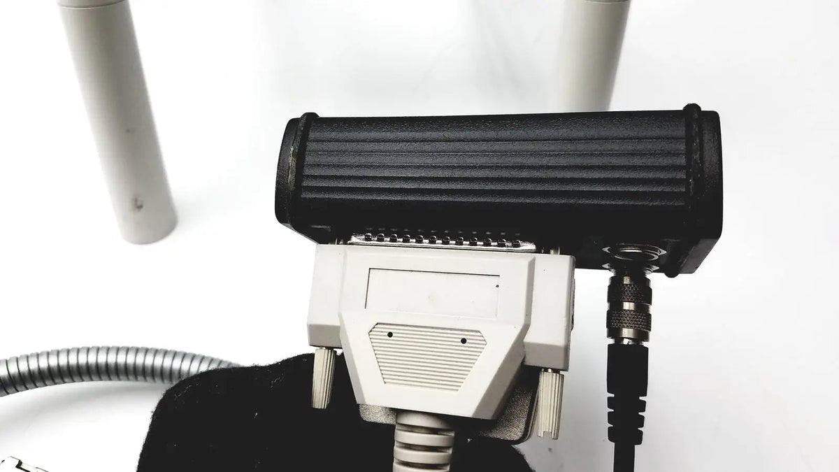 Black ribbed rectangular engineering hrti laser head with white connector and attached cables for Heidelberg Engineering hrti model LSC210
