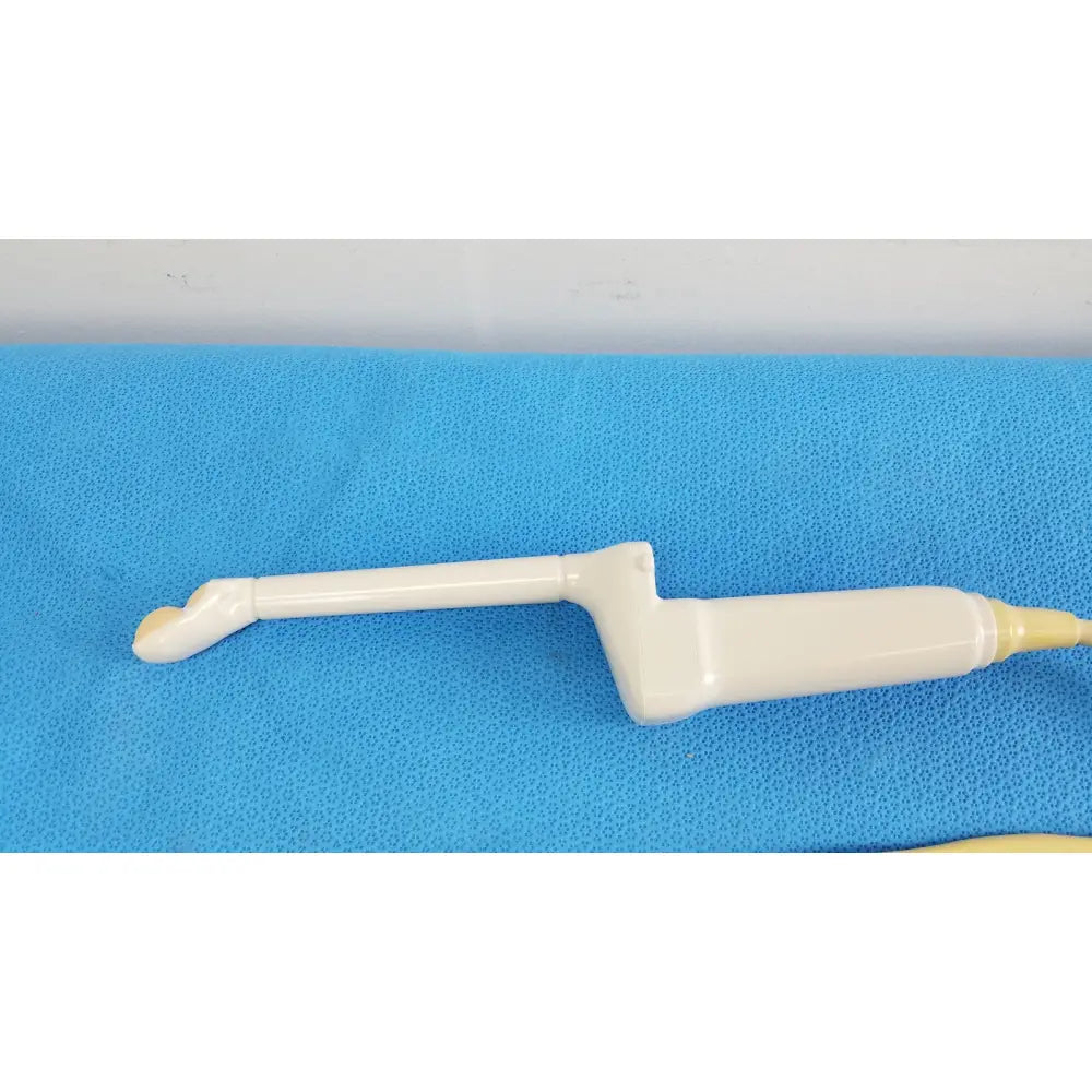 Cream-colored plastic hitachi cc41r ultrasound probe with curved handle and tapered tip for medical imaging use