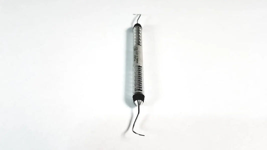 Silver metallic spring-loaded hu-friedy explorer 11/12 odu pq2n7 dental instrument with black rubberized grips