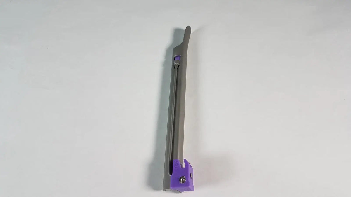 Purple and silver intubrite miller laryngoscope blade with sleek elongated stainless steel handle for surgical use