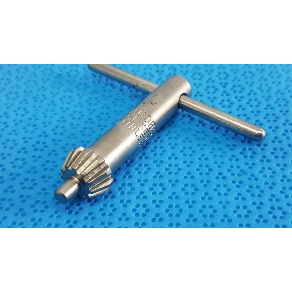 Silver metal jacobs kim key 1m stainless precision chuck key with gear-like end and engraved markings for drill systems