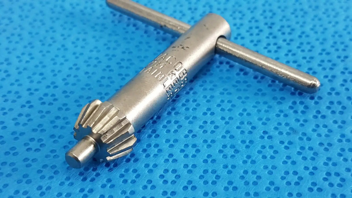 Silver metal jacobs kim key 1m stainless precision chuck key with gear-like end and engraved markings for drill systems