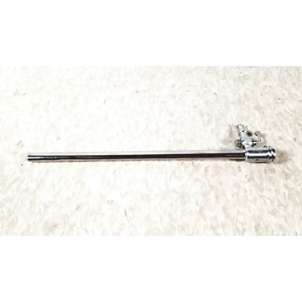 Chrome-finished karl storz 27090j endoscope obturator with slender shaft and articulated control mechanism for surgical use