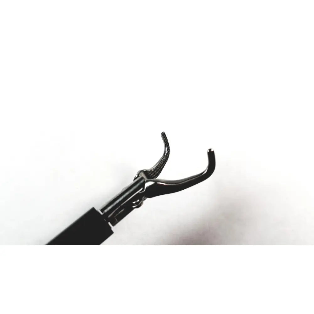 Black metal karl storz surgical handle with textured grip and curved jaws for reuse medical endoscopy procedures