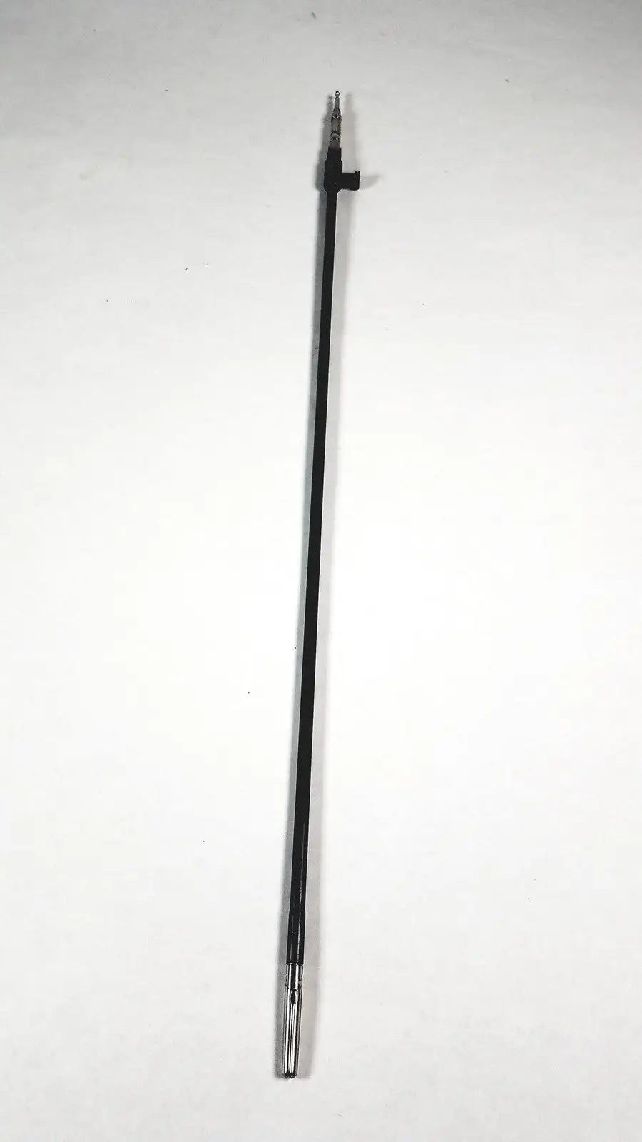 Black carbon fiber rod with metallic tip and threaded end in Karl Storz 33300MW Clickline scissors insert surgical tool