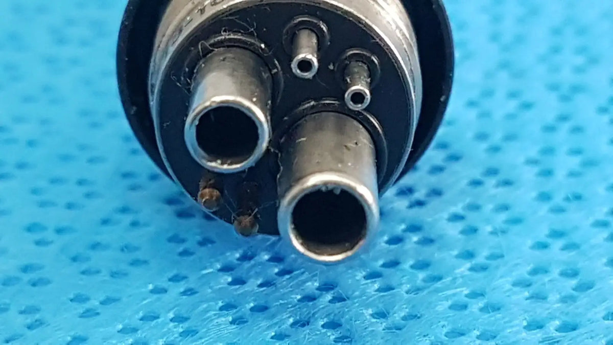 Black and silver surgical pin 460led coupler with three metallic ports for dental handpiece connector use