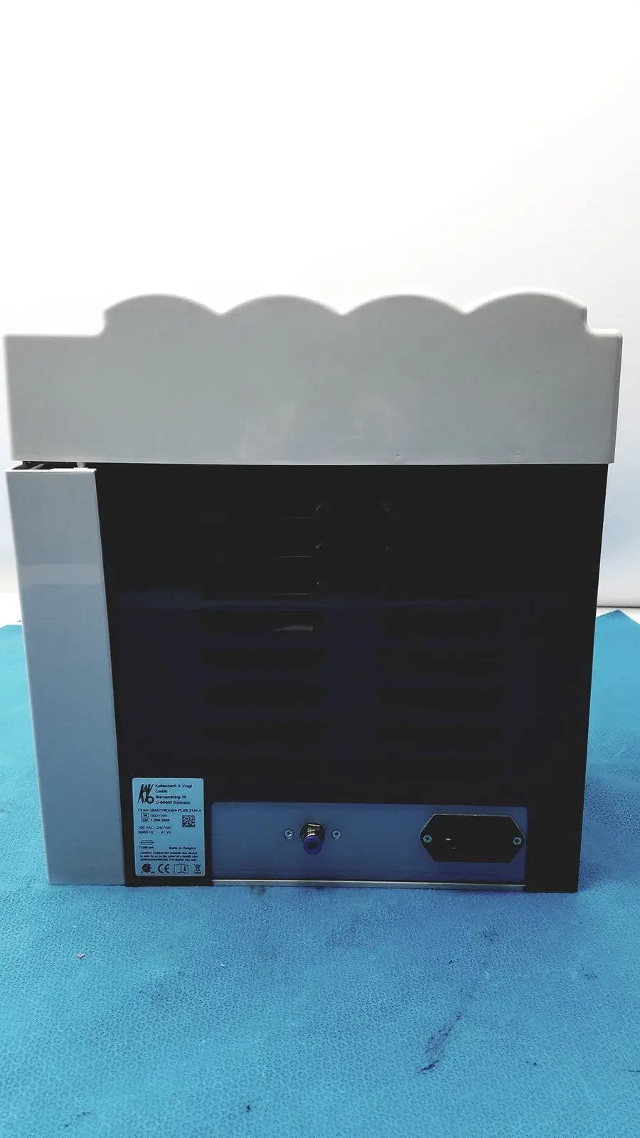 Gray and black industrial-grade printer with scalloped top edge for kavo quattrocare plus handpiece maintenance system