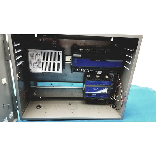 Gray metal industrial control panel housing electronic components including power supply for kryptonite cmt22a access control
