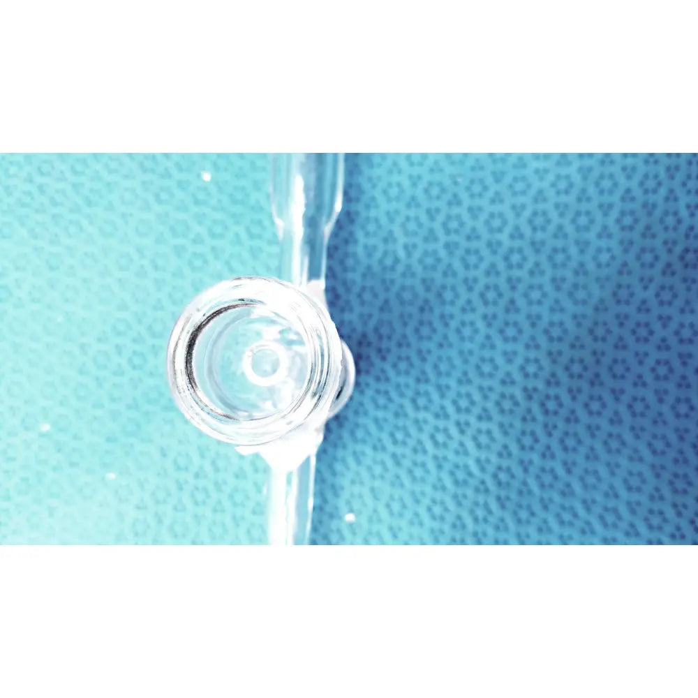 Clear glass laboratory glass adapter stopcock valve with cylindrical body and rounded tip borosilicate glass 24/40 joint