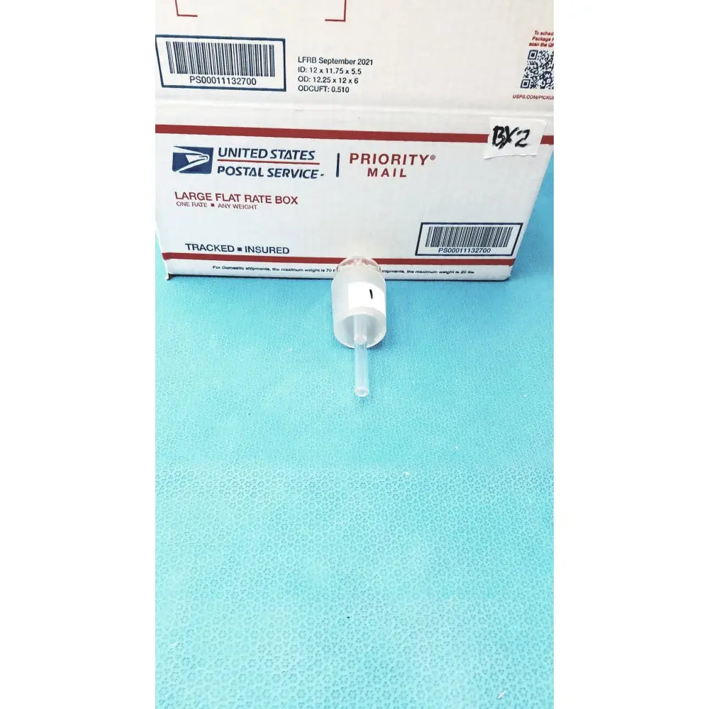 White plastic medical syringe tip with clear barrel and needle featuring chemical-resistant laboratory stopper standard taper fit