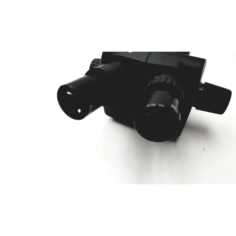 Black dual-lens leica gz6t stereo zoom microscope with matte finish and textured adjustment knobs for precise viewing