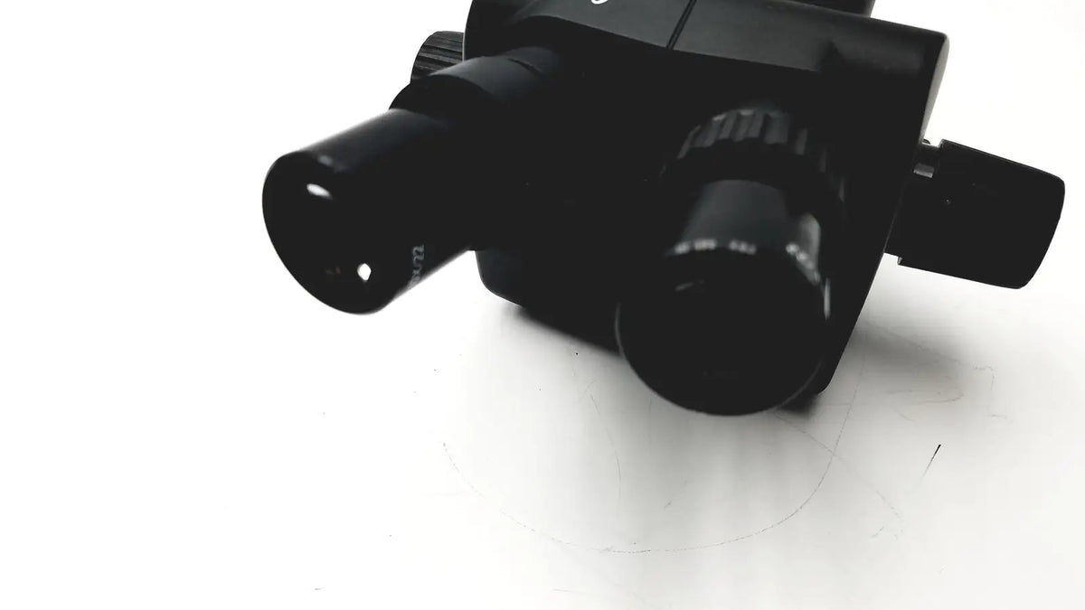 Black dual-lens leica gz6t stereo zoom microscope with matte finish and textured adjustment knobs for precise viewing