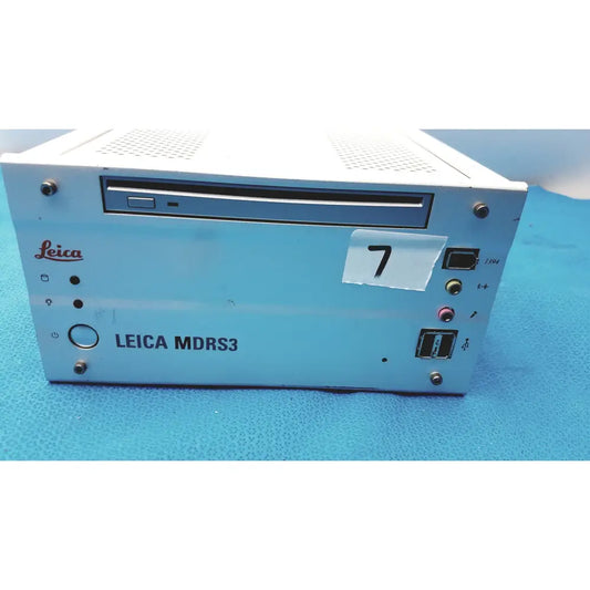 Light blue Leica MDRS3 CD drive with silver front panel and side ports in Leica MDRS4 medical digital recording system