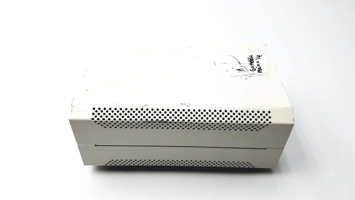 White plastic xbox 360 console with perforated ventilation grilles featuring lej mbq 52ac supply ballast power supply ballast