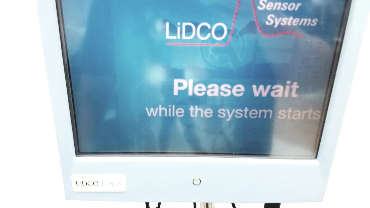 White plastic lidco hm-81-01 rapid hemodynamic monitor with blue screen and power supply on rolling stand