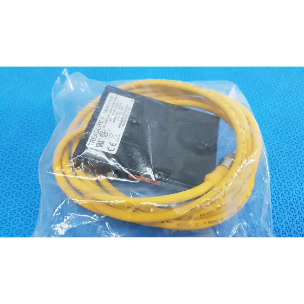 Yellow coiled cable with black linemaster treadlite t-91-s foot switch connector in clear plastic packaging for electric control pedal