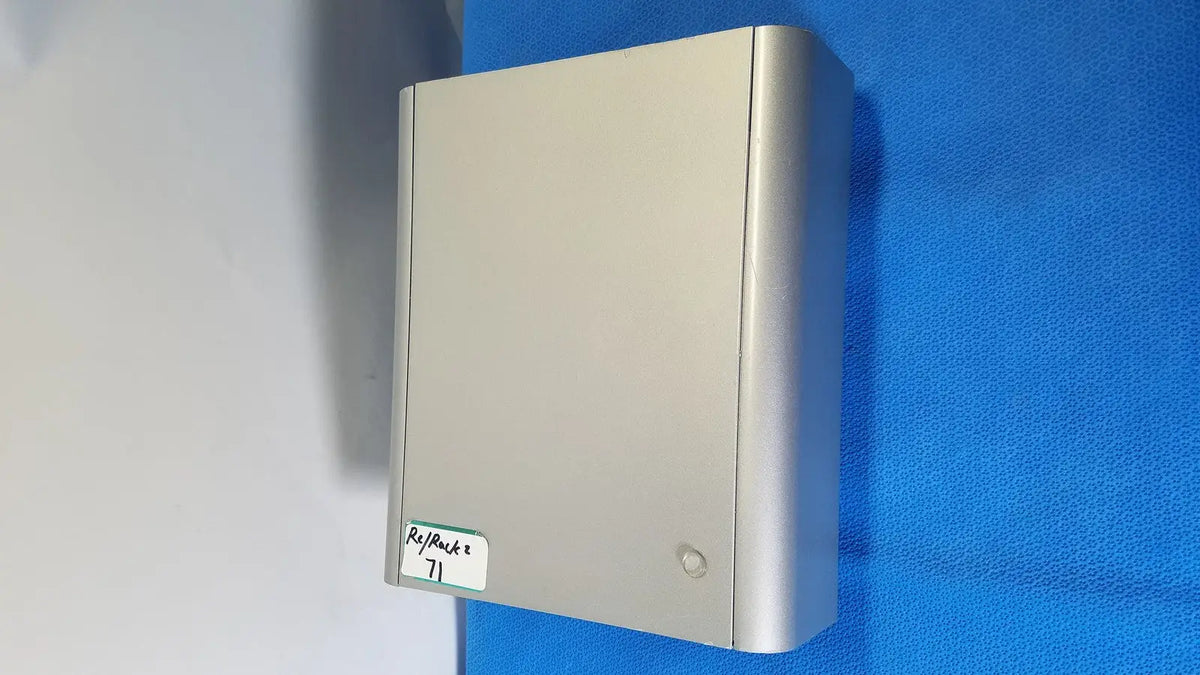 Silver metallic rectangular wall-mounted box with knob labeled rayrack 71 on lonza 4d-nucleofector x unit reuse medical device