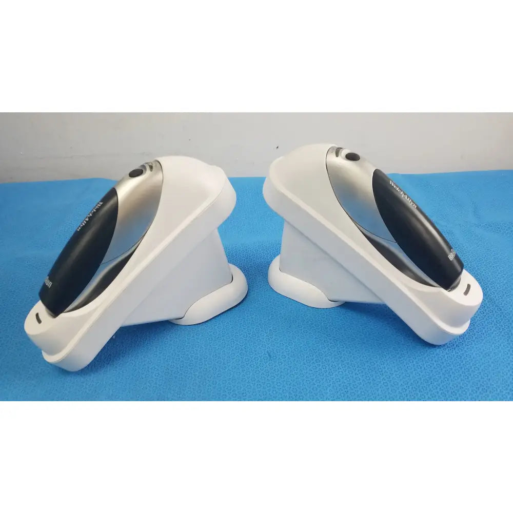 Lot of 2 Braun Pro 4000 ThermoScan medical equipment with Welch Allyn white and black barcode scanners in charging docks
