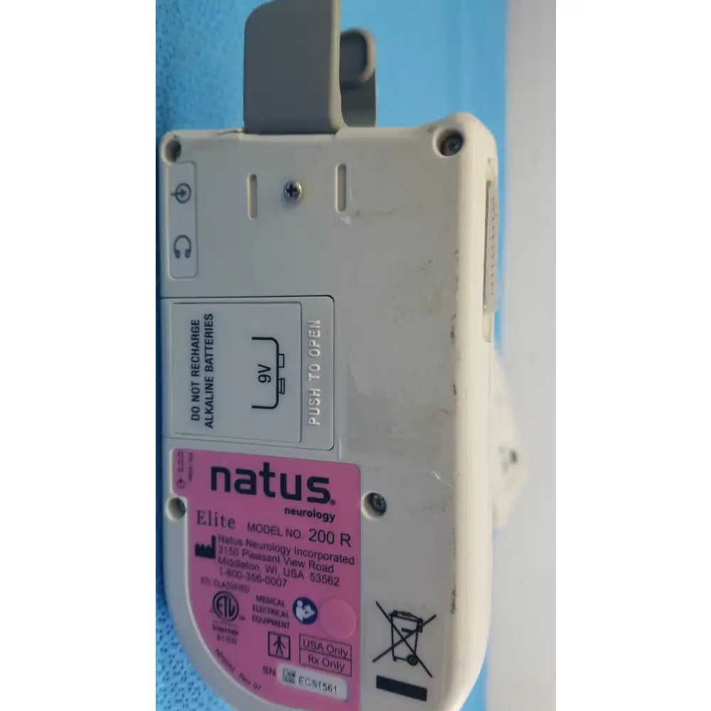 White plastic handheld doppler with pink natus label model number for reuse medical equipment natus neurology elite device