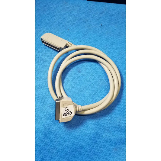Beige coiled male to parallel port cable with two d-sub connectors one labeled 5 gy3 for parallel port use