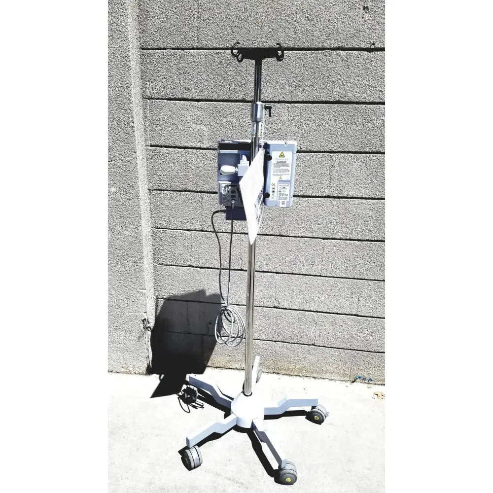 Masimo mridium 3600+ silver and white medical iv stand with four caster wheels for mri infusion pump monitoring systems
