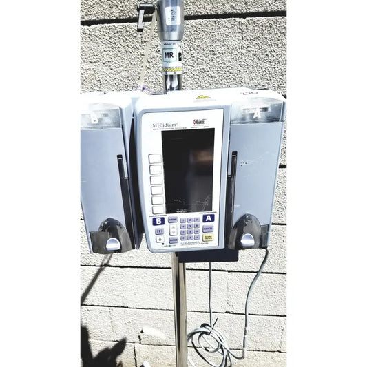 Gray medtronic mri infusion pump with digital display and control buttons for infusion pump monitoring systems