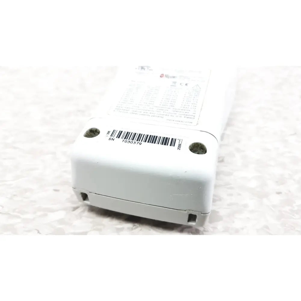 White plastic remote control showing barcode on back for masimo radical-7 signal pulse oximetry touch color monitor